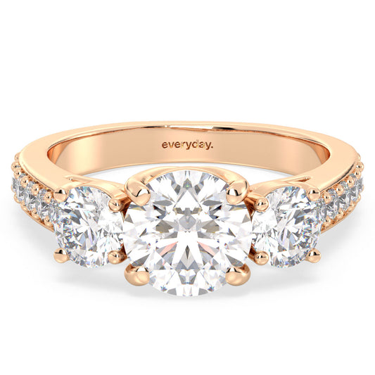 SOPHIA ROUND CUT LAB GROWN DIAMOND THREE STONE ELEGANT ENGAGEMENT RING WITH STUDDED SHANK, GOLD